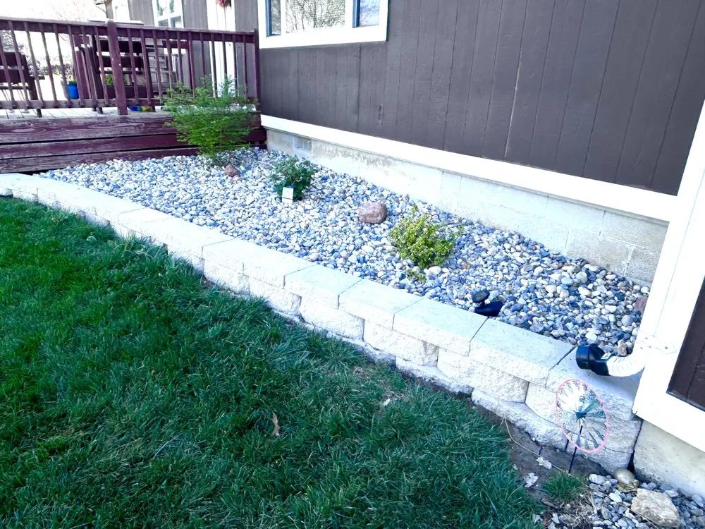 Affordable yard maintenance for homes in Topeka, KS by Lopez Lawns