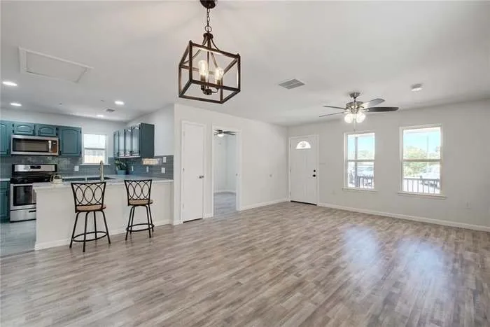 Custom lawn mowing service for residential properties in Austin, TX by Lopez Painting and Welding