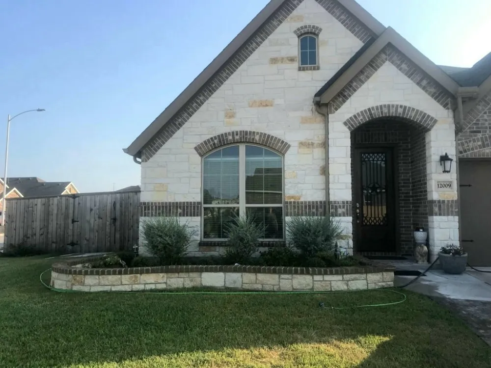 Expert lawn mowing service in Buda, TX by Lopez Stone & Landscaping