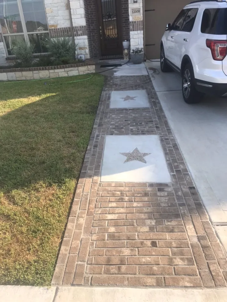 Custom landscape installation in Buda, TX by Lopez Stone & Landscaping