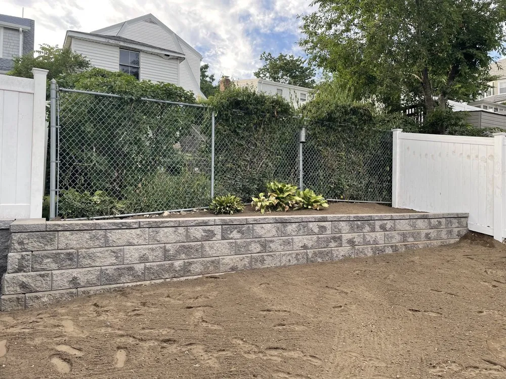 Professional lawn mowing service for outdoor upgrades across Lynn, MA - Lopez Vicente Masonry & Construction