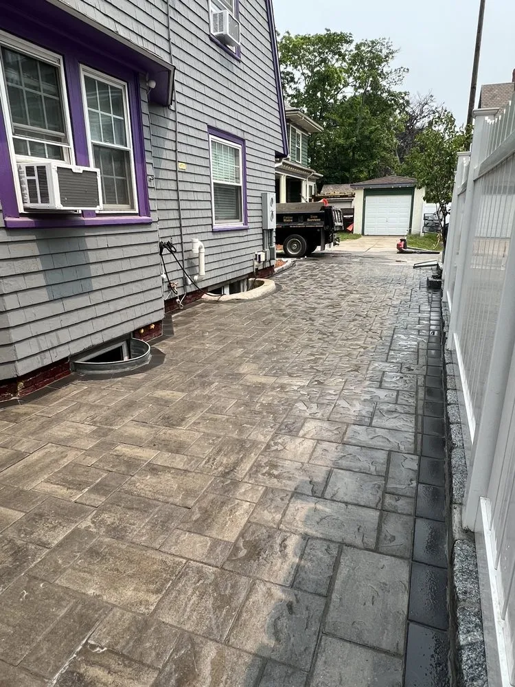 Affordable lawn mowing service for homes in Lynn, MA by Lopez Vicente Masonry & Construction