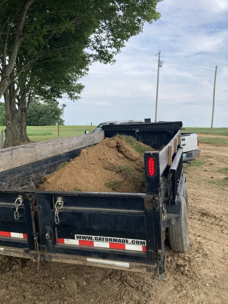Custom lawn mowing service for year-round maintenance in Scottsville, KY by Loren’s Skid Steer Services