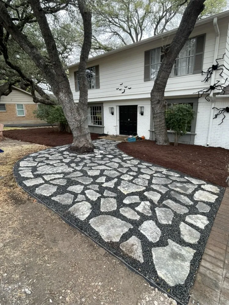 Custom garden landscaping in Pflugerville, TX by Lorenzo Landscaping