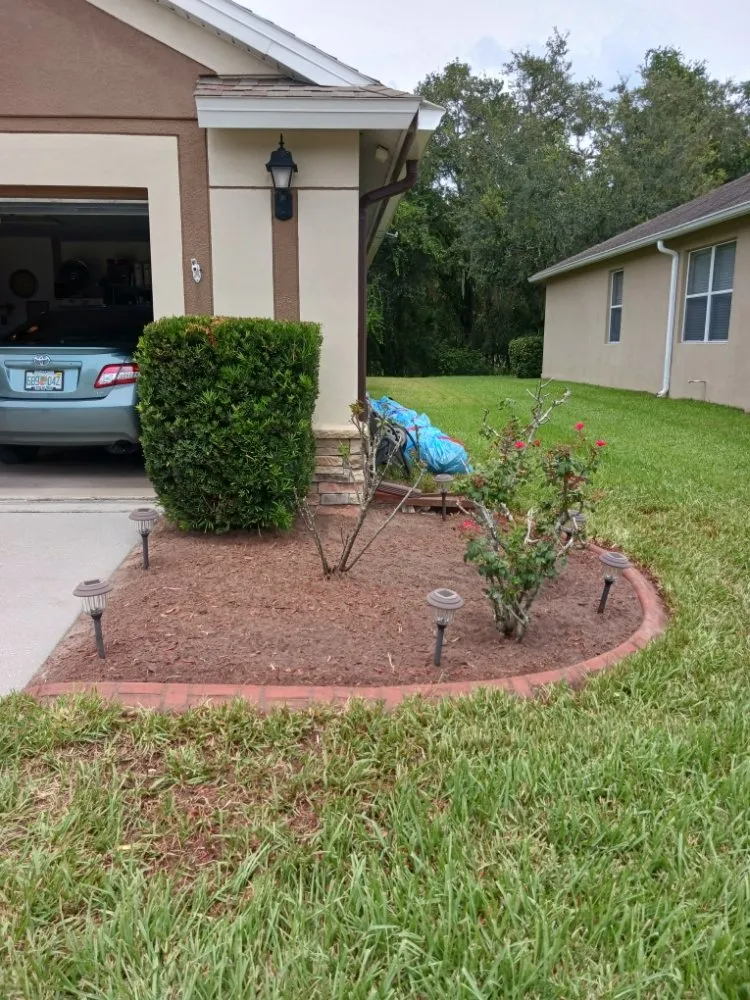 Reliable lawn mowing service in Hudson, FL by Lori's Landscape Weeding & Pruning Services