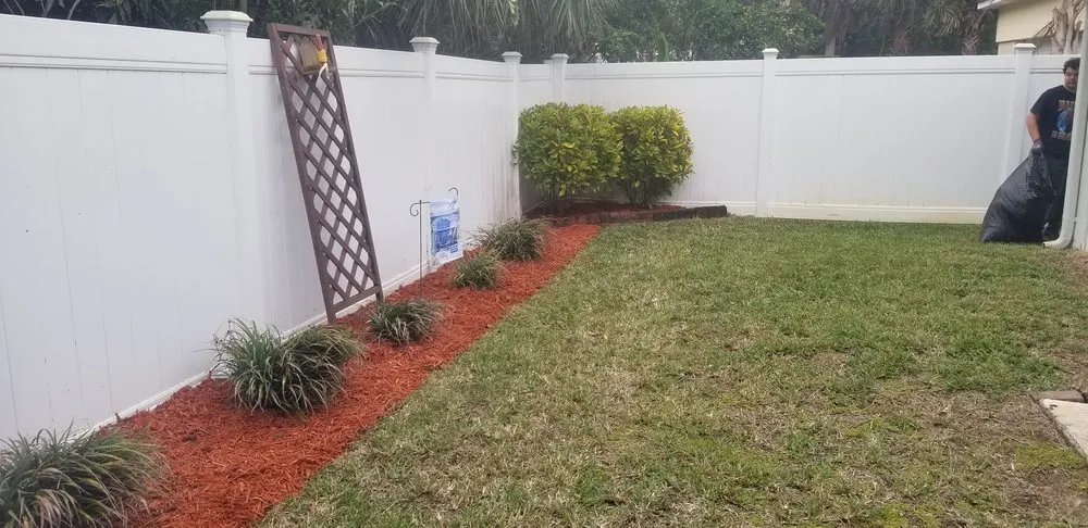 Professional landscape installation for year-round maintenance in Palm Coast, FL by Los Compadres Lawn Service