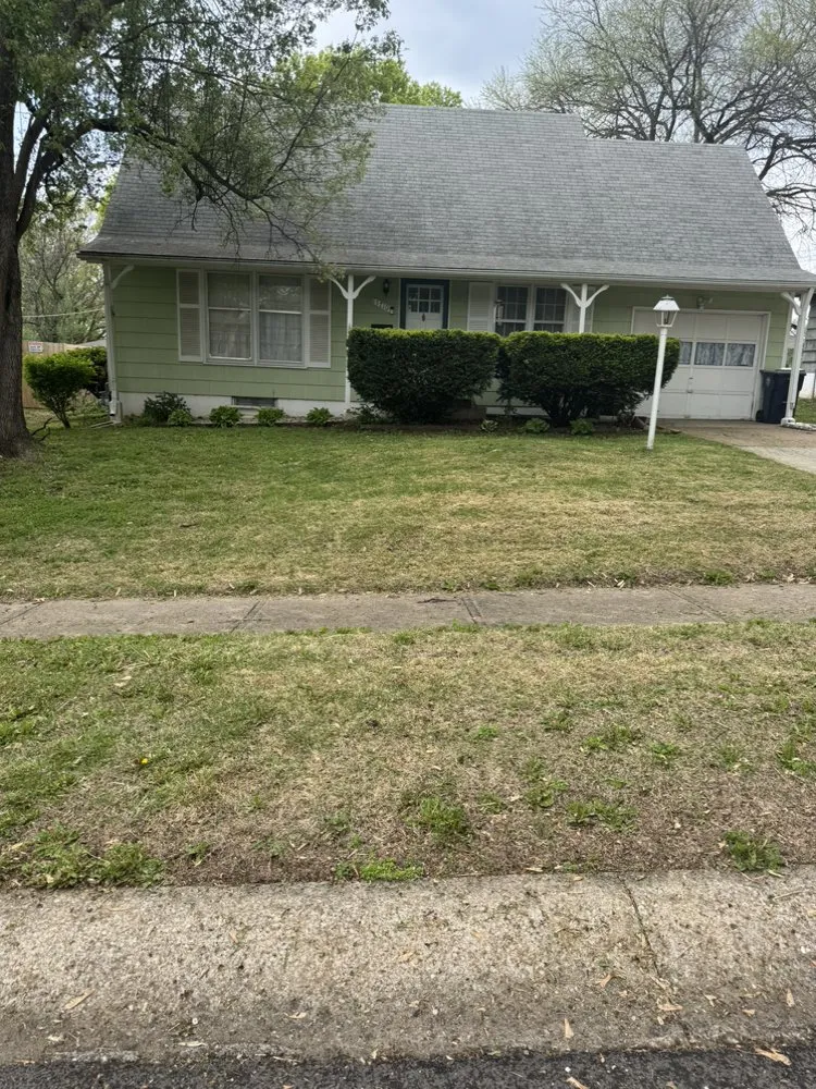Expert landscaping services for residential properties in Kansas City, MO by Lottas Lawn Service