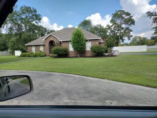 Lotts Lawn Care, Landscaping and Pressure Washing Logo