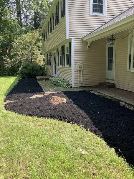 Custom lawn mowing service with custom design in Brookline, NH by Lotus Landscaping