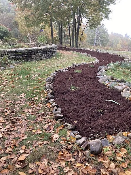 Custom garden landscaping for outdoor upgrades in Brookline, NH by Lotus Landscaping