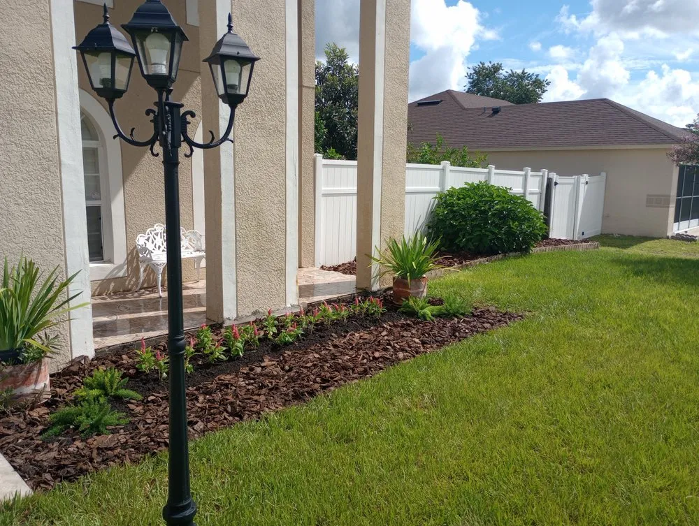 Trusted lawn mowing service in Orange City, FL by Louis and Stardema Elite Landscaping