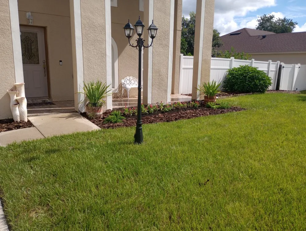 Top-rated landscape design with custom design in Orange City, FL by Louis and Stardema Elite Landscaping