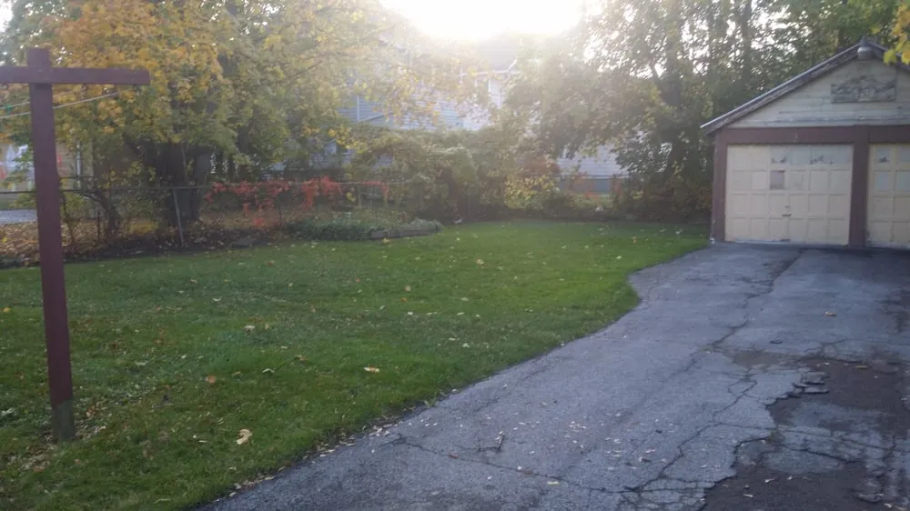 Professional yard cleanup service for homes across Rochester, NY - Louis Lawn Care & Snow Plow