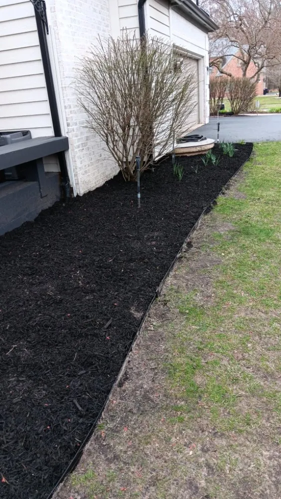 Custom landscape installation in North Baltimore, OH by Louis Lawn Care