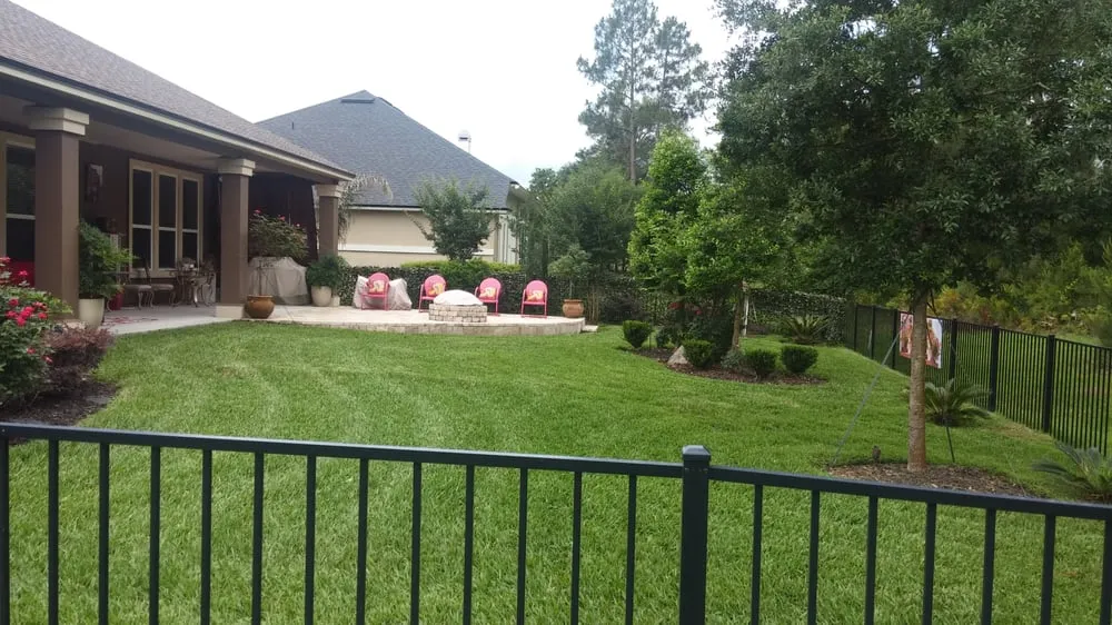 Professional landscape installation with custom design in Jacksonville, FL by Lou’s Quality Lawn and Landscaping Service