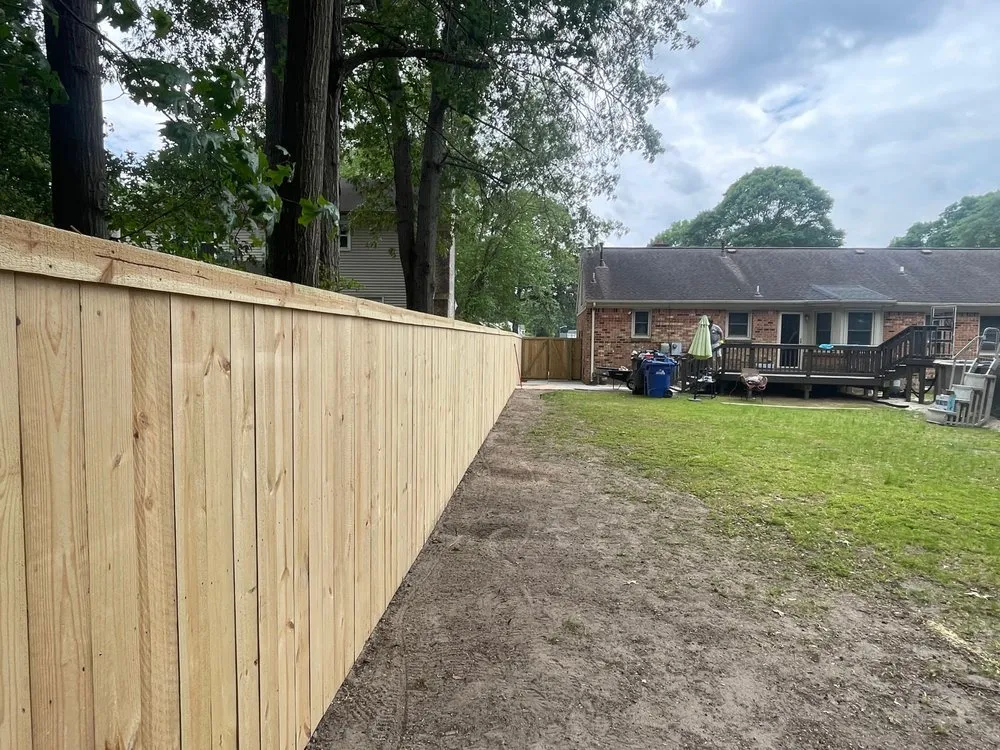 Local lawn mowing service with custom design in Suffolk, VA by Love Homes and Gardens