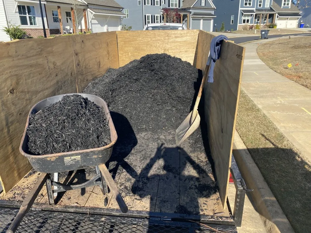 Custom residential landscaping for year-round maintenance in Woodstock, GA by Lovelace Lawn Care and Landscaping