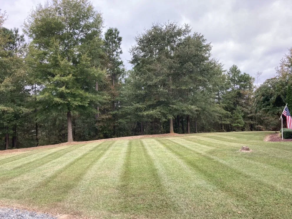 Professional lawn mowing service in Sanford, NC by Love’s Construction and Landscaping