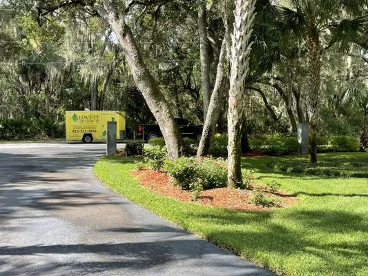 Lovett Or Leaf It Lawncare Services Logo