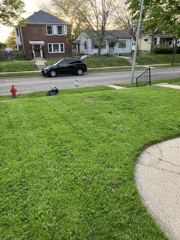 Affordable landscape design for homes in Milwaukee, WI by Lowe Cutz Lawn Services