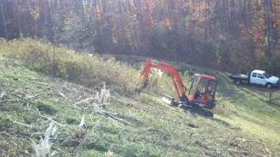 Local outdoor landscaping in Mount Airy, NC - Lowe's Long Arm Bush Hogging