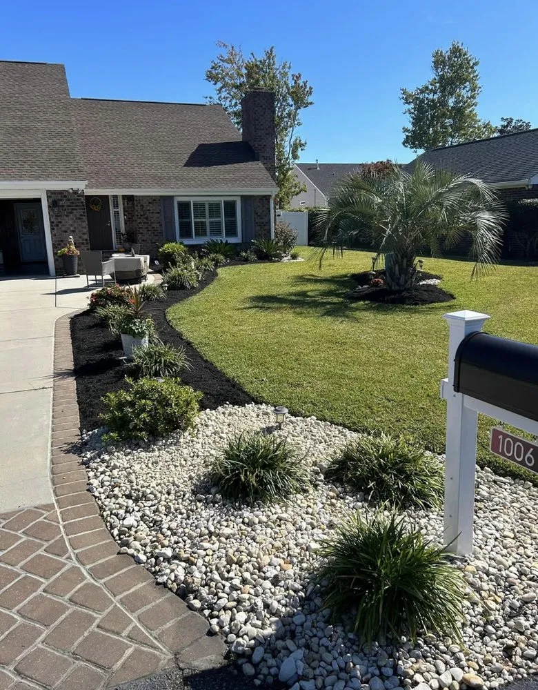 Custom outdoor landscaping for year-round maintenance in Surfside Beach, SC by Lowland Labor