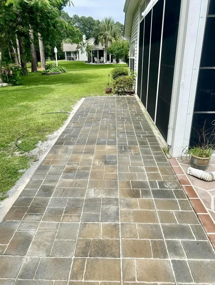 Professional lawn mowing service for year-round maintenance in Surfside Beach, SC by Lowland Labor