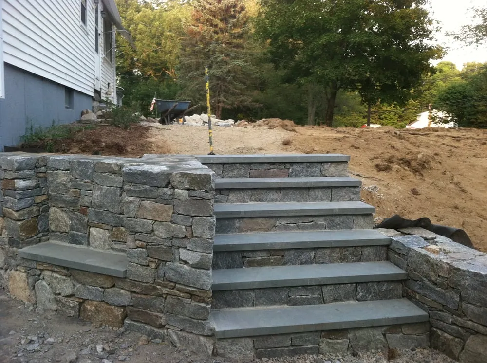 Professional outdoor landscaping for residential properties in Uxbridge, MA by Lowrey's Landscapes