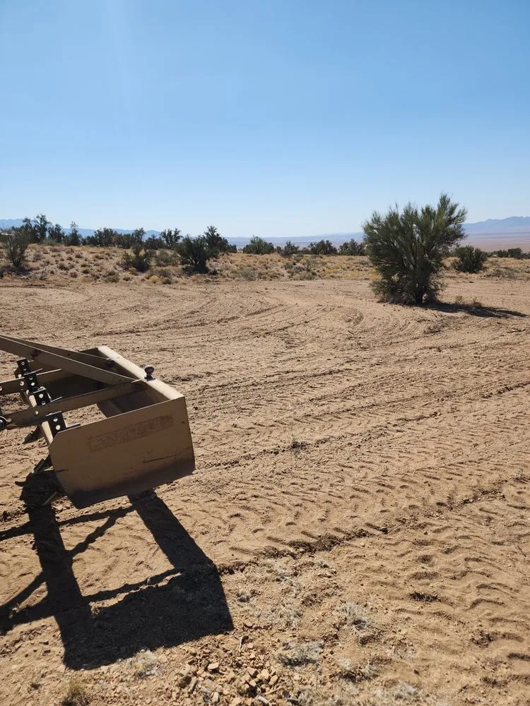 Affordable lawn mowing service for residential properties in Kingman, AZ by LS Tractor & Backhoe Services