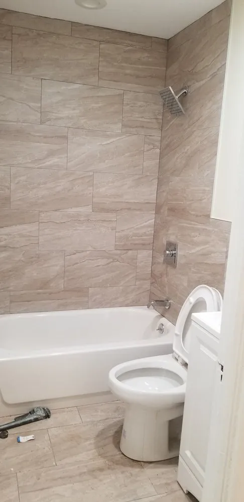 Reliable lawn mowing service for outdoor upgrades in Orange, NJ by Luigi General Contractors Paving & Landscaping