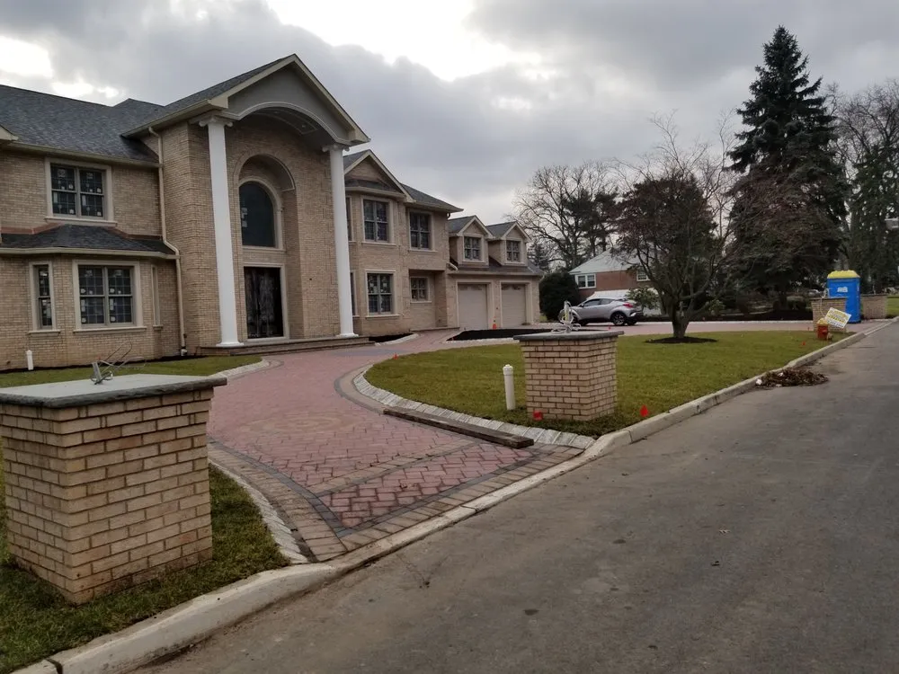 Local lawn mowing service for outdoor upgrades in Orange, NJ by Luigi General Contractors Paving & Landscaping