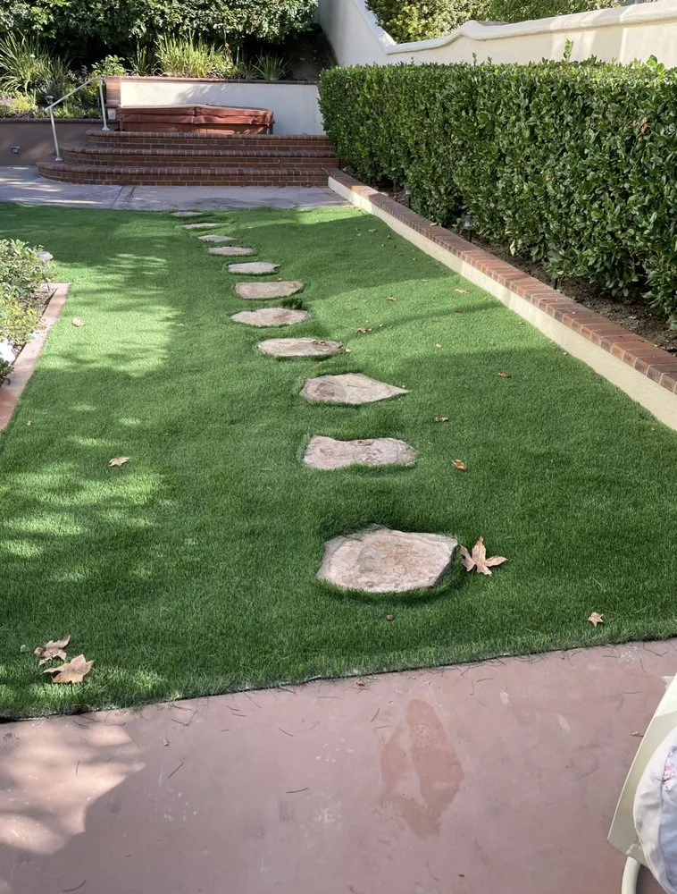 Custom outdoor landscaping with custom design across Santa Ana, CA - Luis A Putting Green
