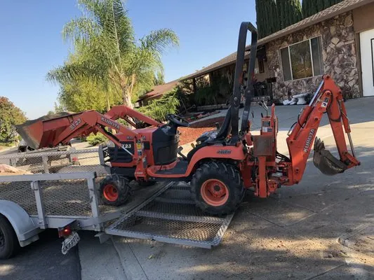 Luis and Romel Landscaping and Hauling Logo