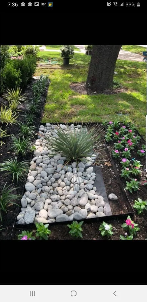 Custom landscape installation with custom design in Dallas, TX by Luis Lawncare
