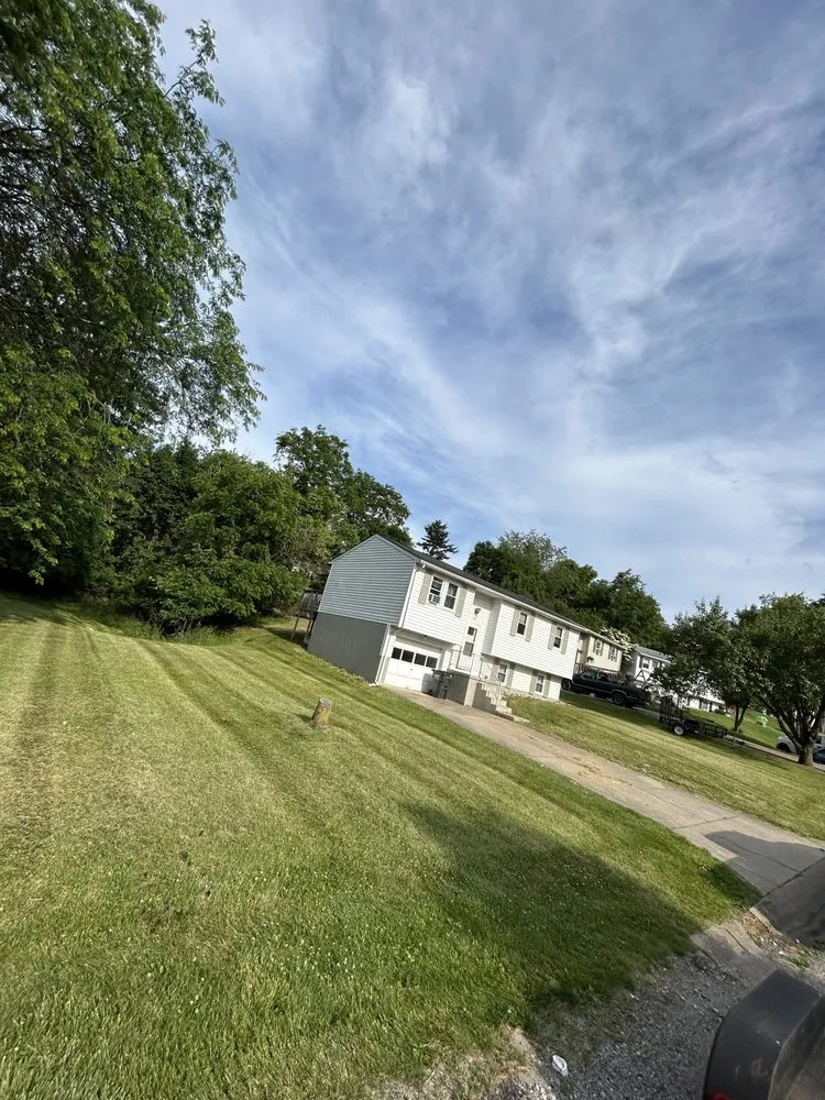 Reliable residential landscaping in Bethesda, OH by Lumberjaxe mowing