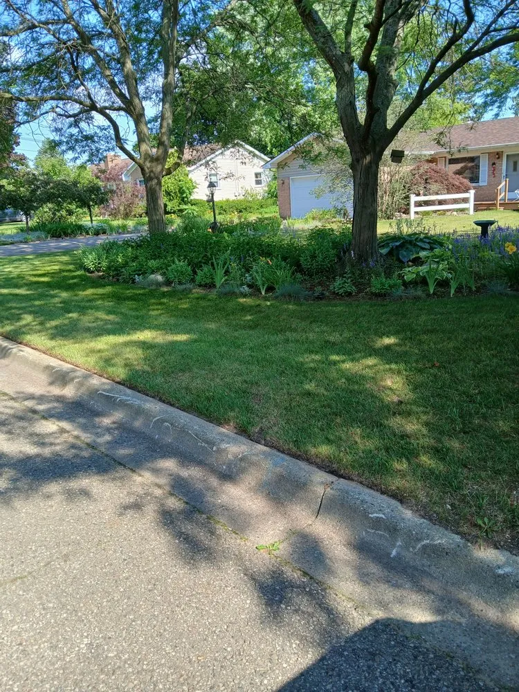 Reliable lawn mowing service for residential properties in Lansing, MI by Lumbert's Lawn and Snow