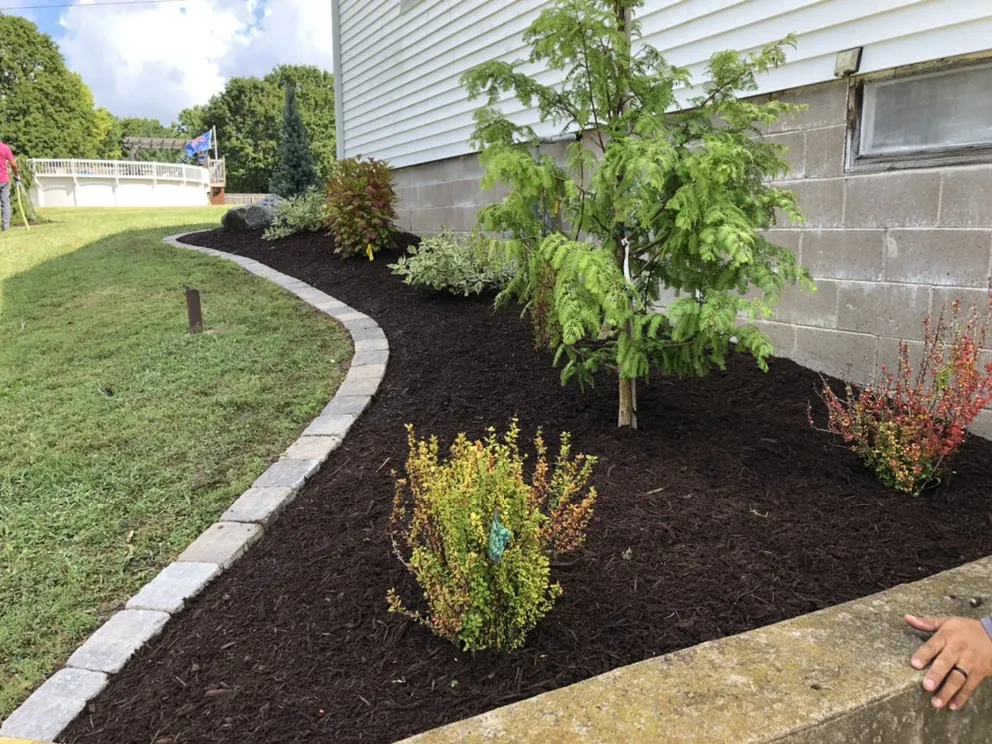 Reliable landscape design for residential properties in Moline, IL by Lundahl Landscaping