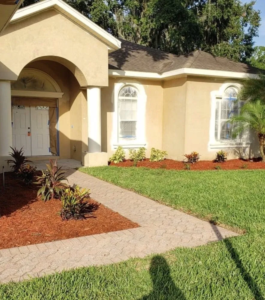 Affordable landscape design for beautiful yards in Palmetto Bay, FL by Lush Greenery Landscaping