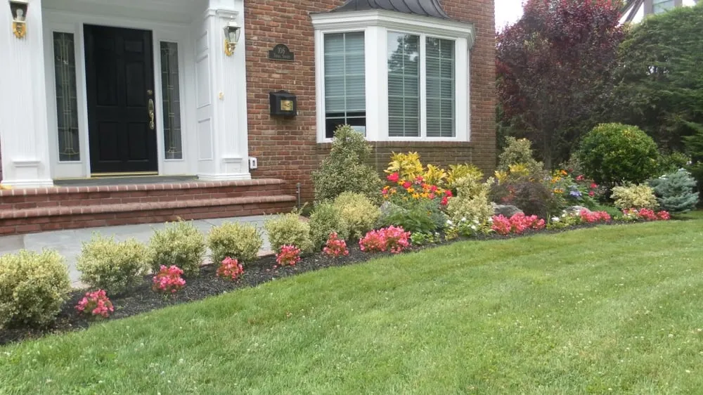 Professional yard cleanup service for outdoor upgrades across Garden City, NY - Lutz Lawn Care