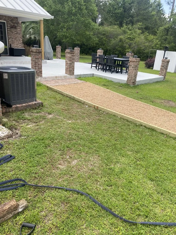 Custom yard cleanup service for residential properties in Tallahassee, FL by Luxurious Landscaping & Design