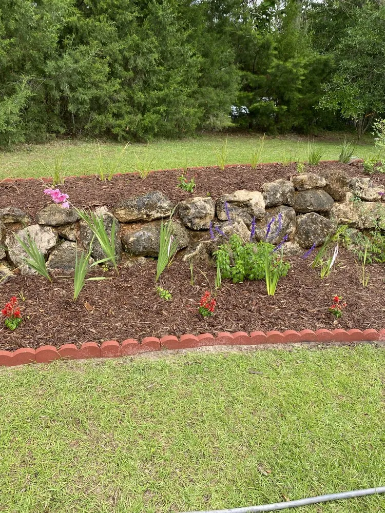 Expert lawn mowing service with custom design in Tallahassee, FL by Luxurious Landscaping & Design