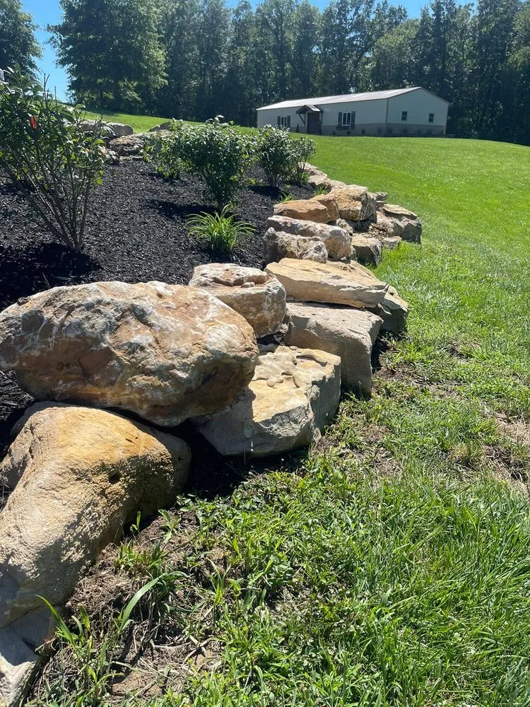 Trusted landscape installation with custom design in Lake Saint Louis, MO by Luxurious Lawn Care and Landscaping