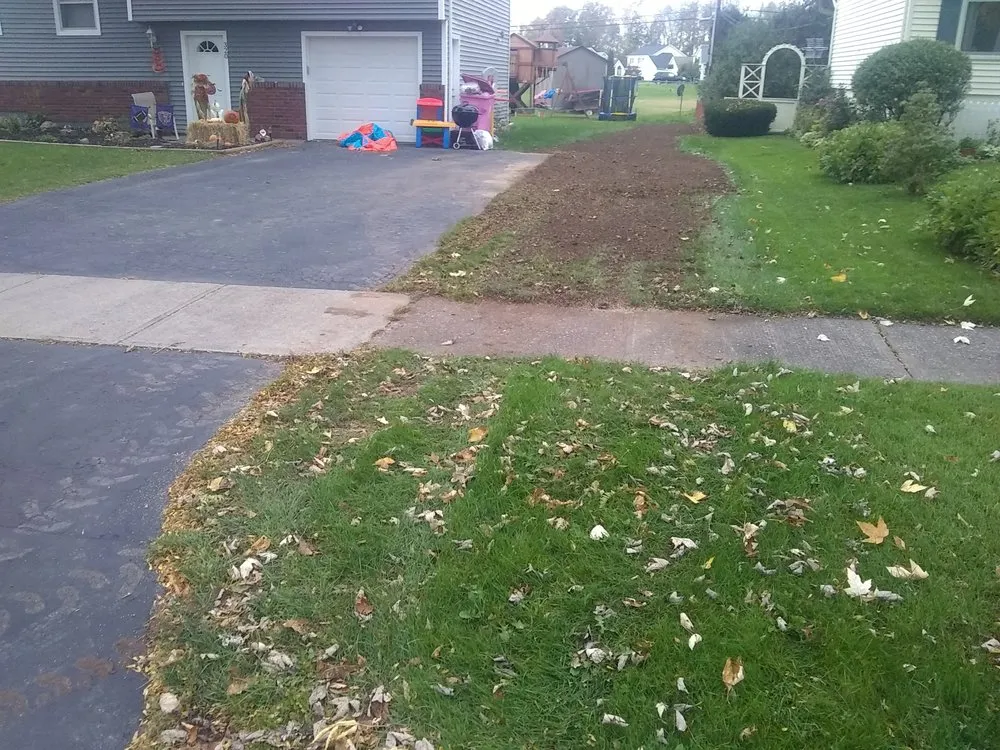 Professional lawn care service for beautiful yards in Holley, NY by Luxury Landscaping & Excavation