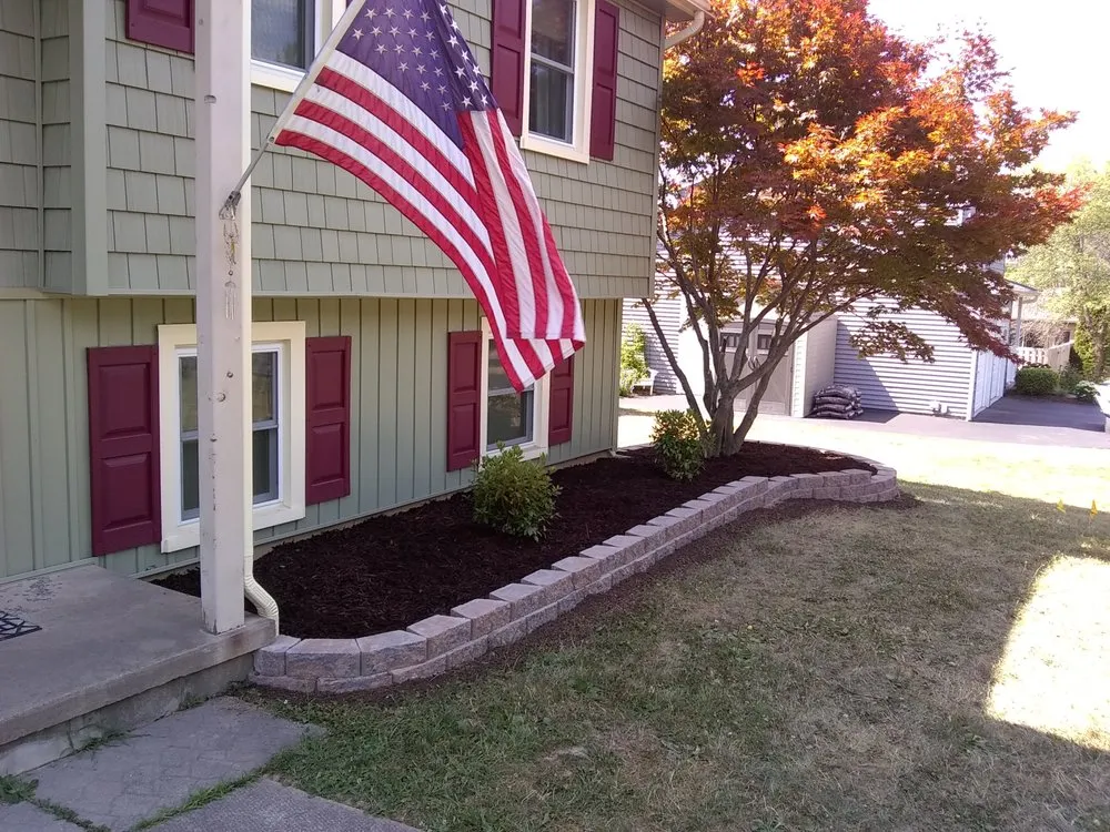 Local lawn mowing service for outdoor upgrades across Holley, NY - Luxury Landscaping & Excavation