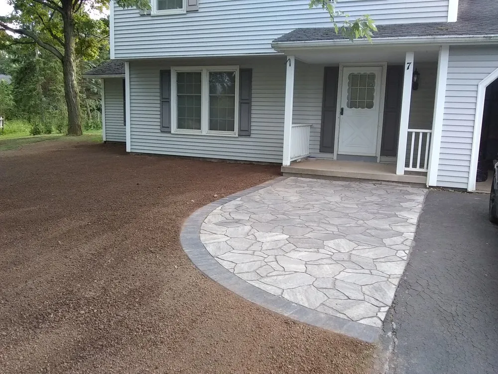 Top-rated lawn care service for homes across Holley, NY - Luxury Landscaping & Excavation