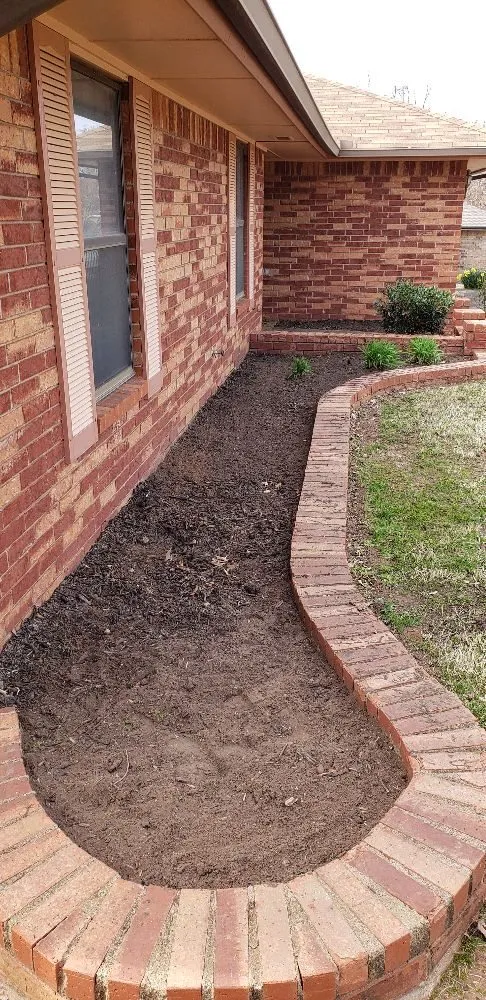 Custom landscape installation for homes in Guthrie, OK by Luxury lawn and landscaping