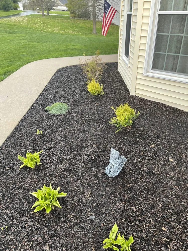 Local lawn care service with custom design in Jackson, MO by Luxury Lawn Services