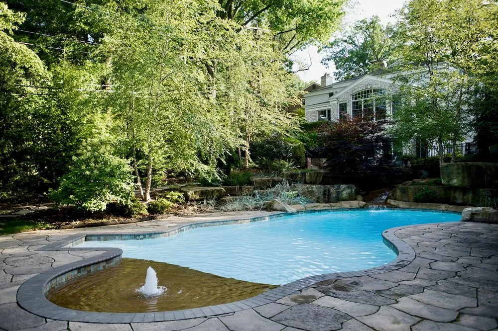 Reliable lawn care service for residential properties across Venetia, PA - Luxury Pools & Waterfalls