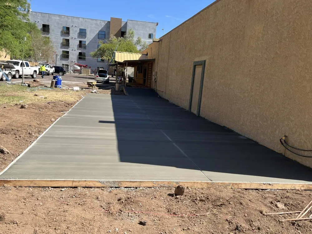 Affordable lawn mowing service for year-round maintenance across Phoenix, AZ - LV Concrete Services