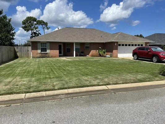 Lyles landscaping & Lawn Care Logo